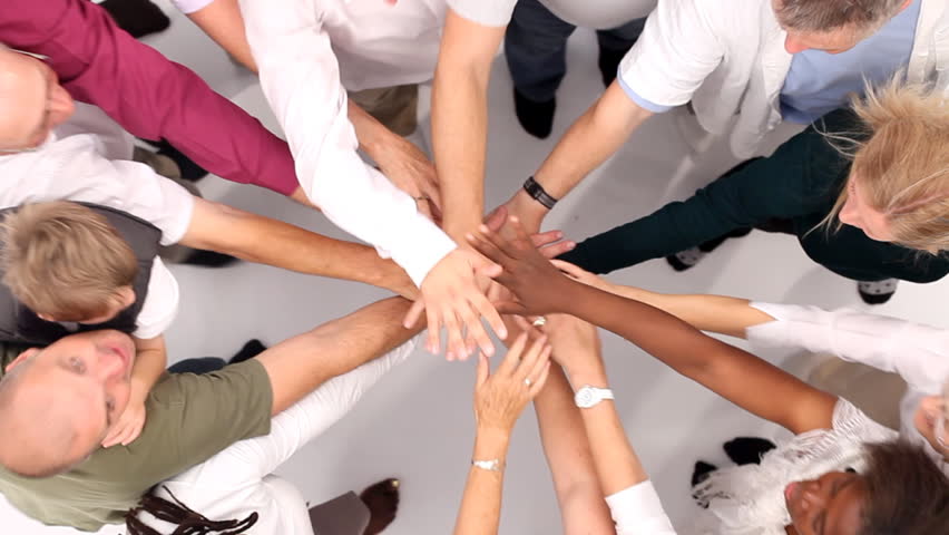 hands of various ehtnic groups making a circle